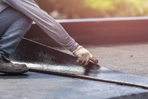 Professional Waterproofing technician working in Brick, NJ